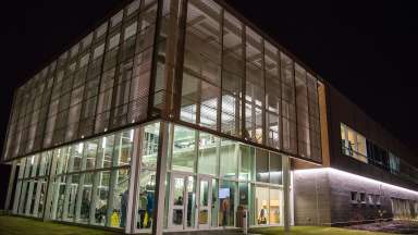Abbotts Creek Community Center at night