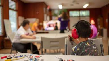 kids in classroom with headphones