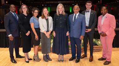 Photo showing council members posing for camera. Left to right: Corey Branch, Megan Patton, Christina Jones, Jane Harrison, Mayor Janet Cowell, Mitchell Silver, Jonathan Lambert-Melton, Stormie Forte