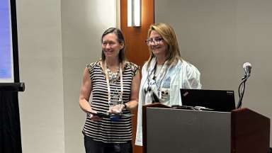 City IT employee Beth Stagner accepts the IDC award. 