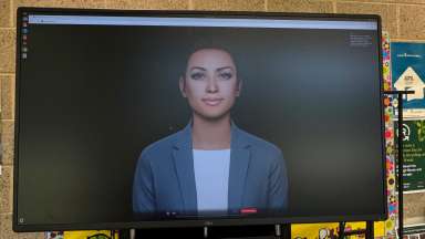 Computer monitor screen displaying digital avatar of a person