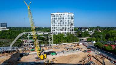 Development Fee Changes - Image of a large crane in a construction zone