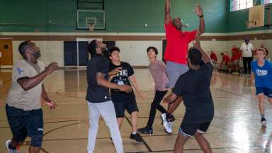 men playing basketball