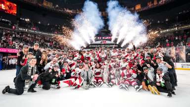 Carolina Hurricanes team on ice with Stanley Cup after winning the championship