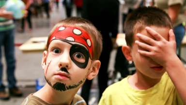 2 children making funny faces