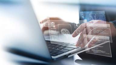 AI Artificial Intelligence. Business man using AI technology for data analysis, coding computer language with digital brain, machine learning on virtual screen, business intelligence.