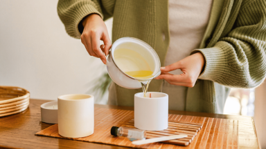 Pouring wax into a candle