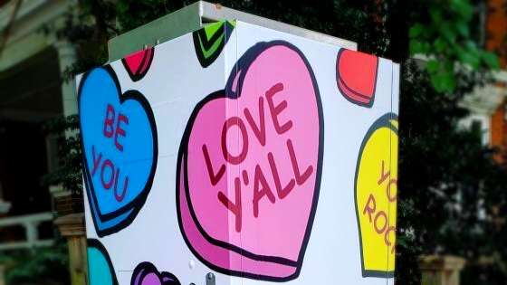 signal box wrapped in art by Gina Franco
