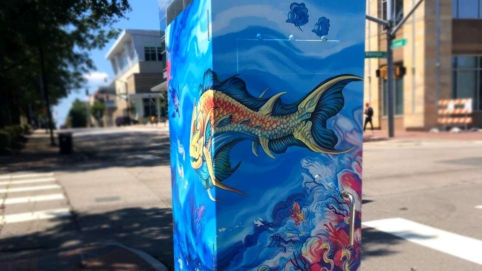 signal box wrapped in art by Sam Greene