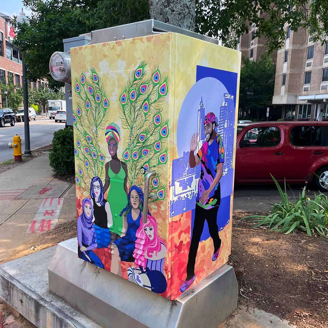 A signal box covered with artwork by Buffy Taylor