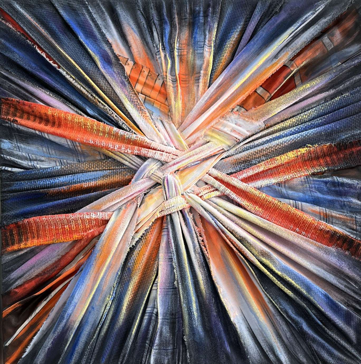 Artwork made with recycled textiles woven in a geometric pattern and painted. 