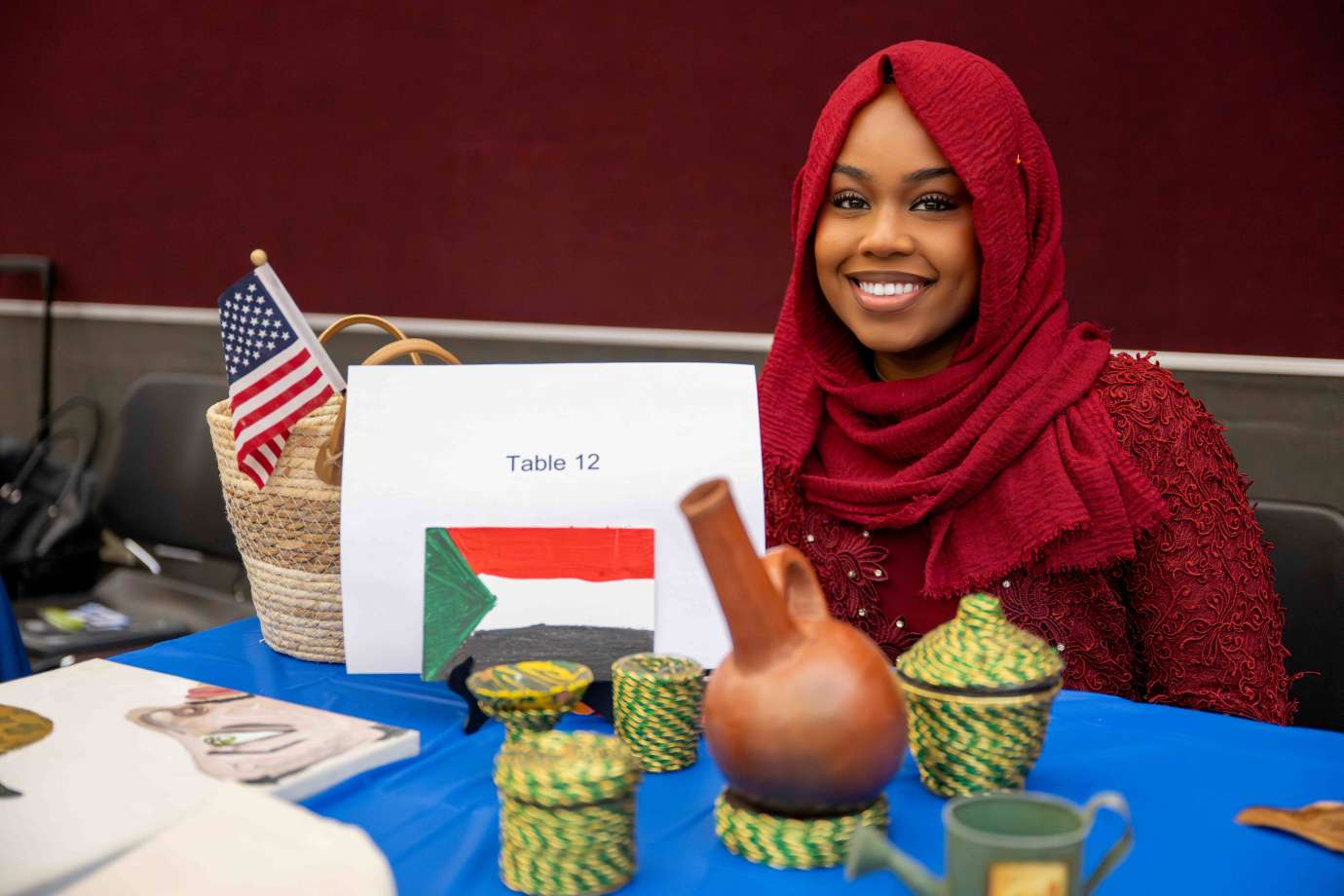 A woman represents Aldar Sudanese Organization 