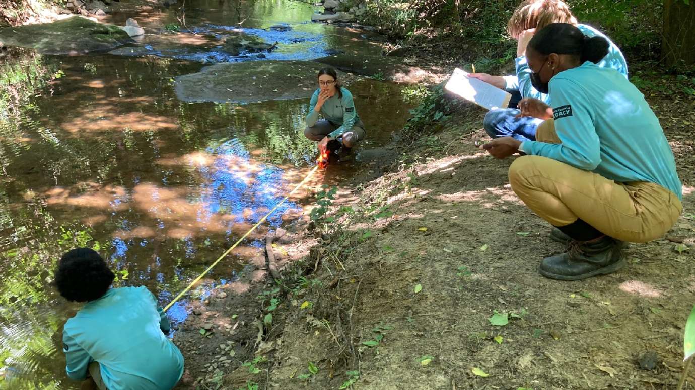 testing the flow and water of the stream