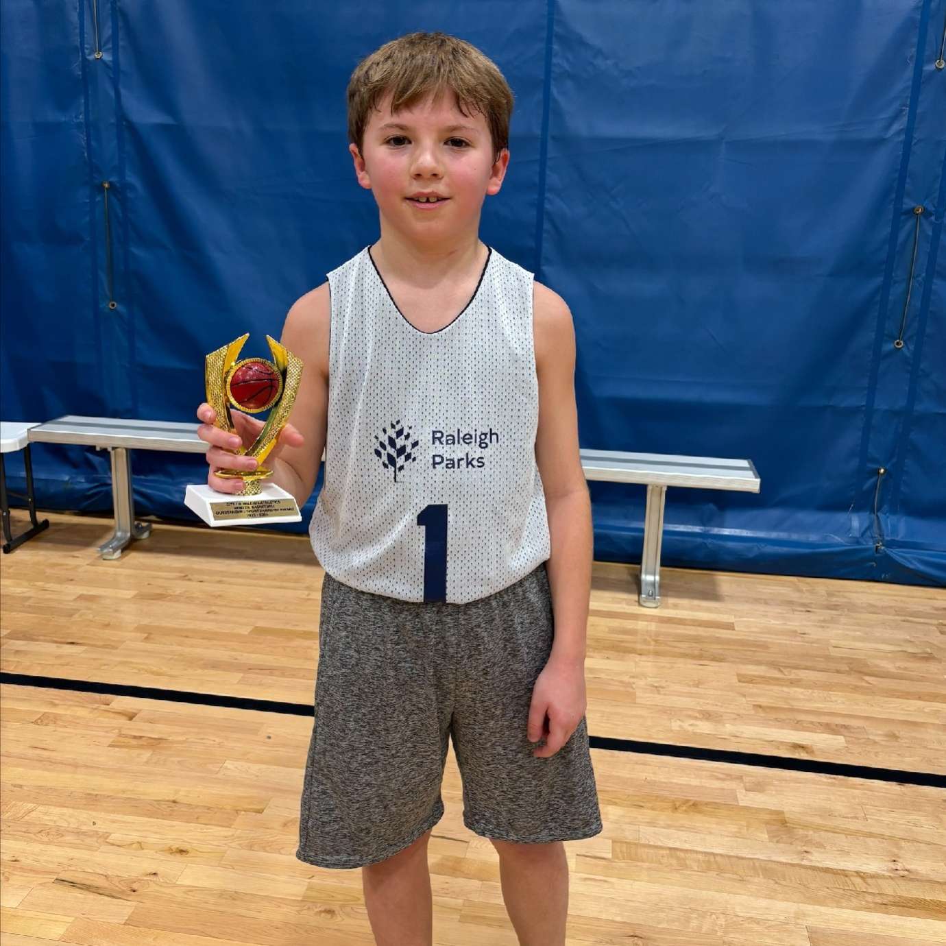 Graydon with basketball trophy