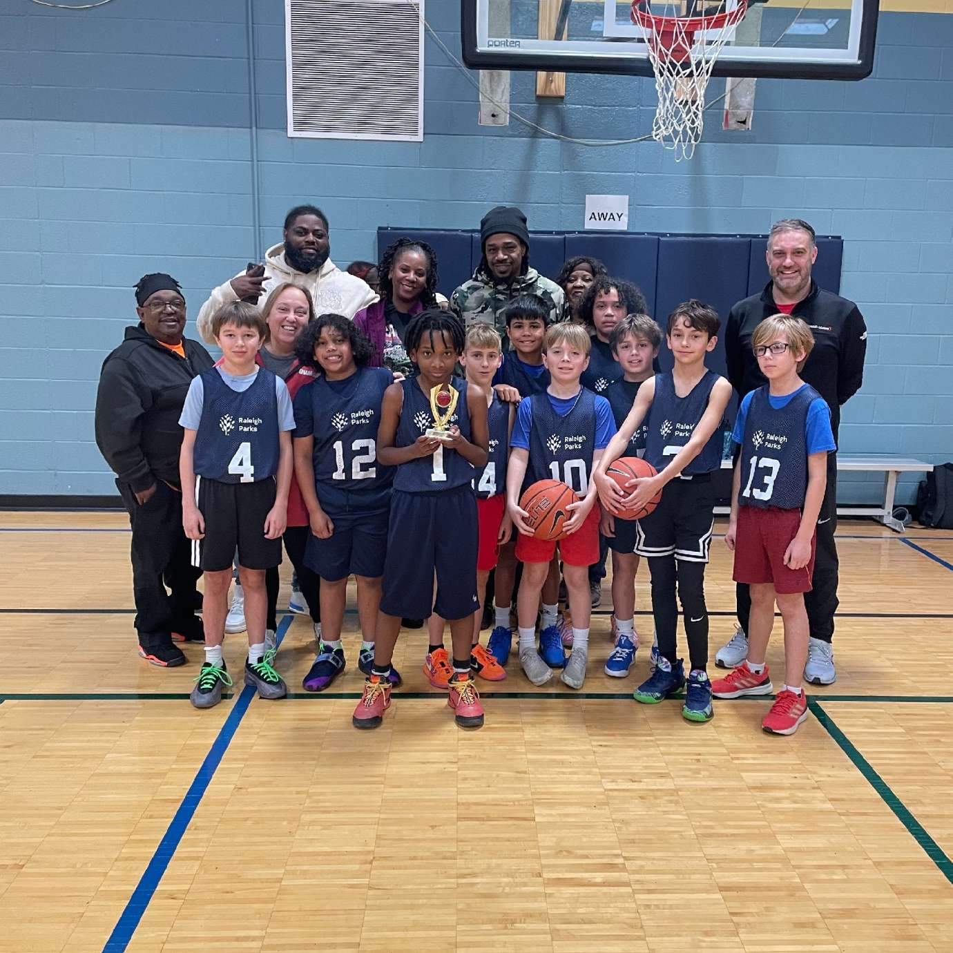Julian and his team with coaches