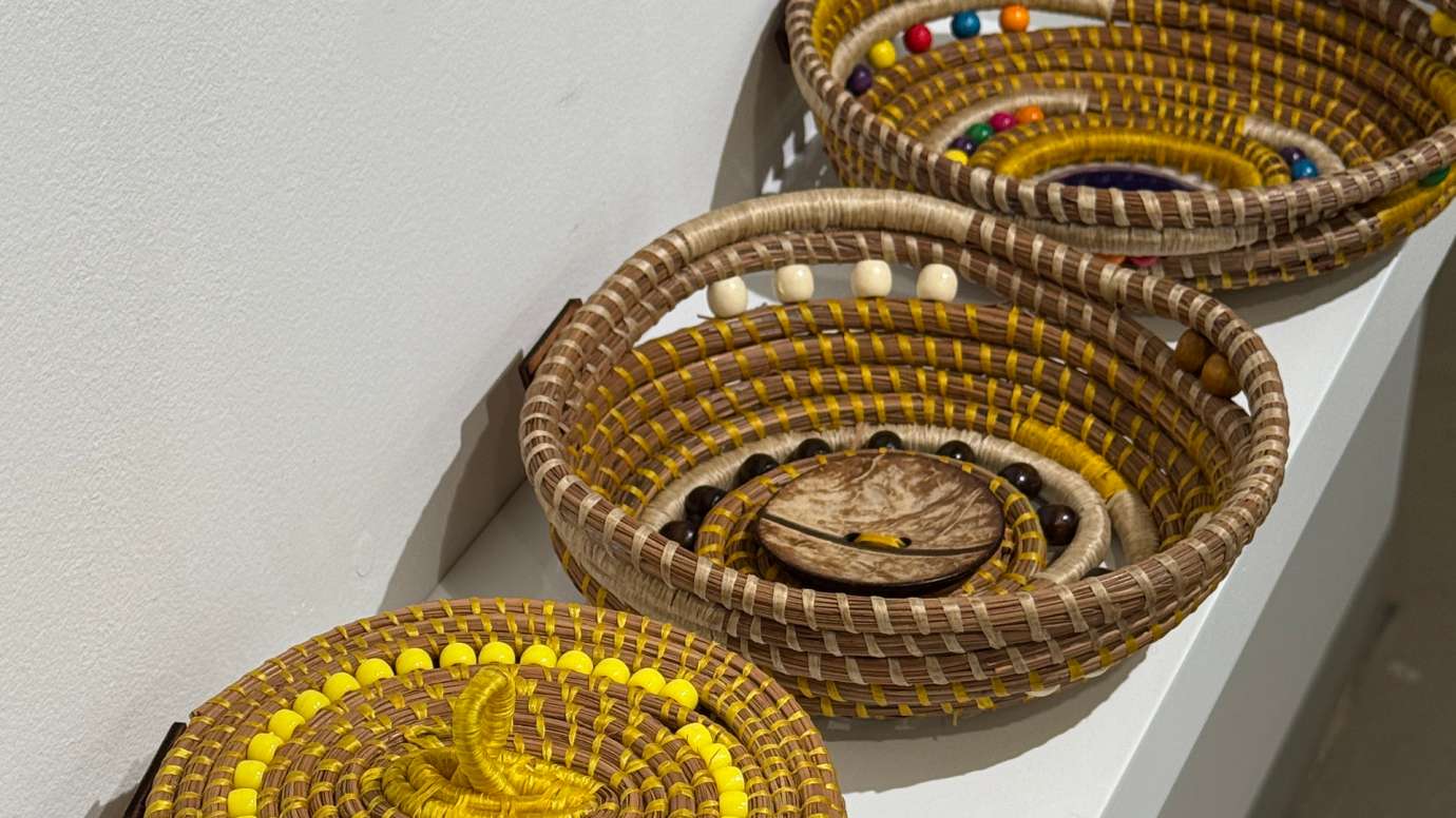 detail of three baskets with colorful accents