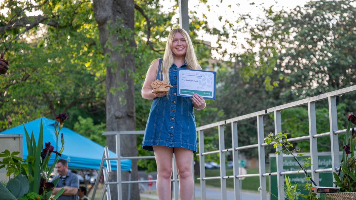 Woman holding certificate
