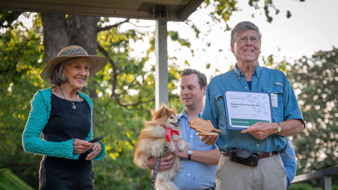 Man holding certificate