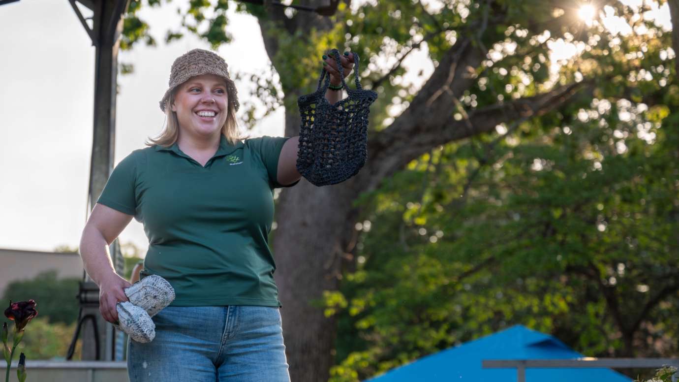 Woman holding a black purse