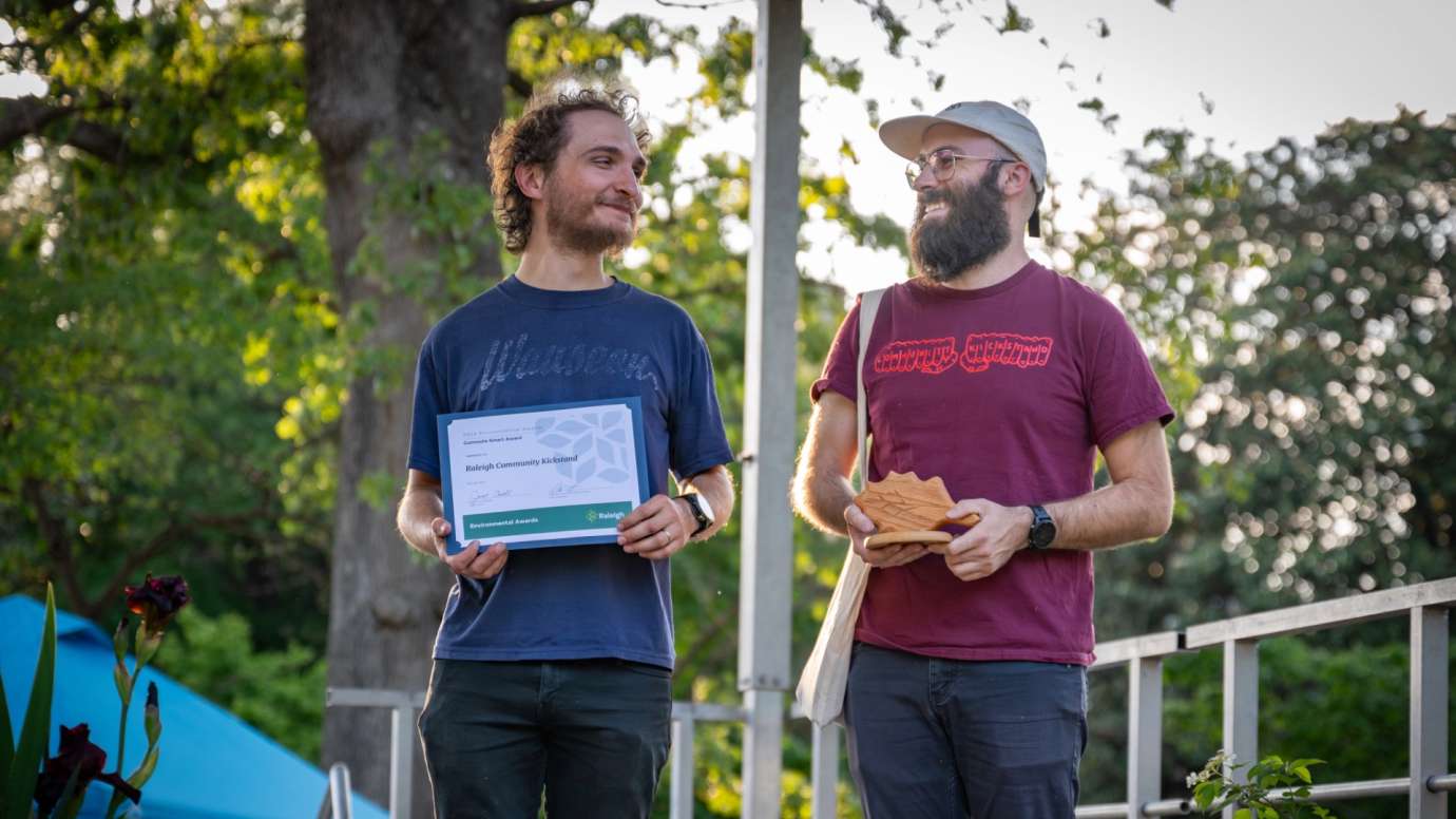 Two people accepting award