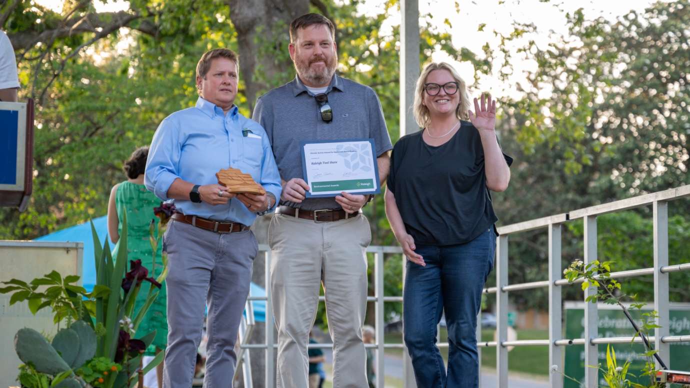 3 people accepting award