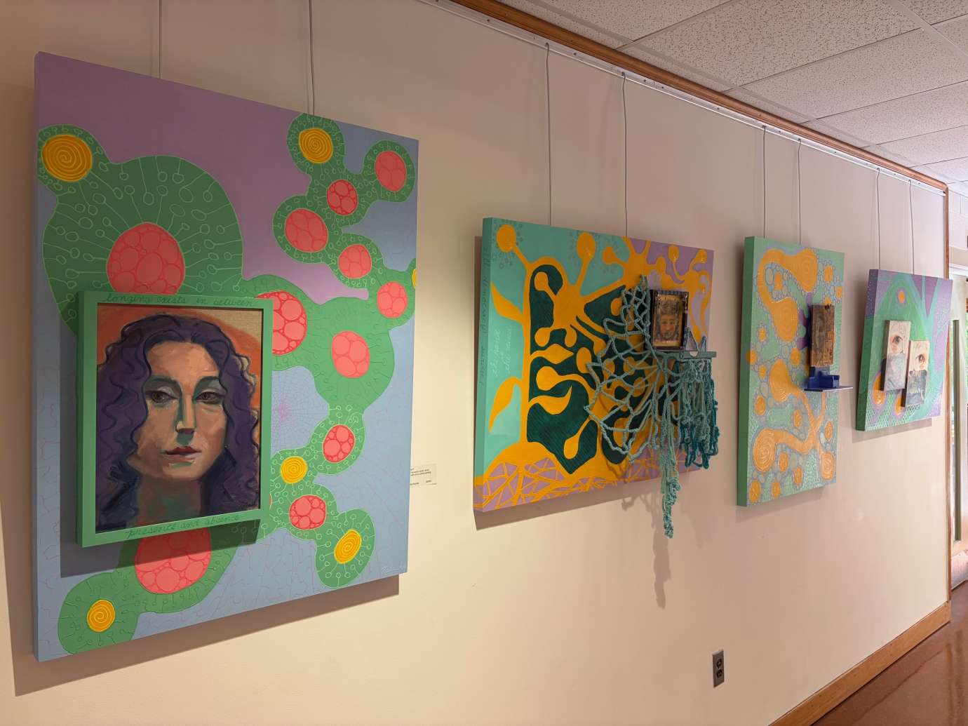 Works by Natacha Sochat hanging on a wall 