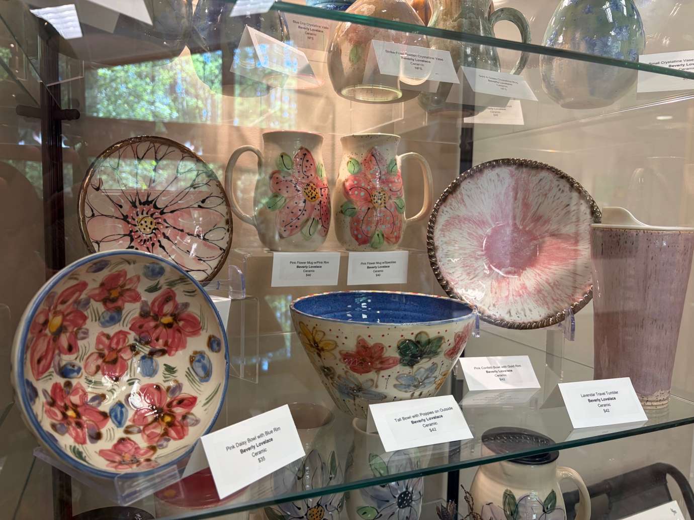 Pottery by Beverly Lovelace in a Glass Display Case 