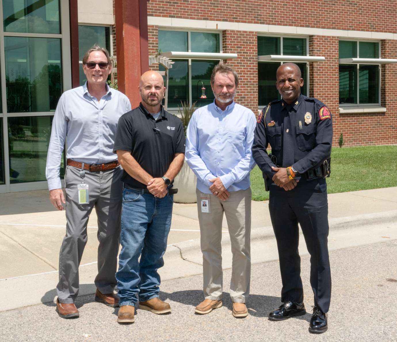 Chief of Police stands with Raleigh Water leadership