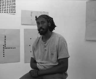 Black and white image of artist Mark Anthony Brown Jr.