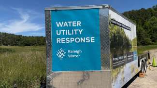 A trailer with Raleigh Water logo and "Water Utility Response" on back