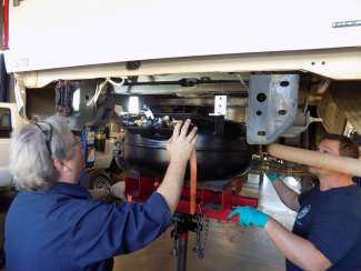 Image showing the install of a renewable propane conversion kit 